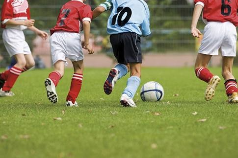 Young boys tend to benefit from sports